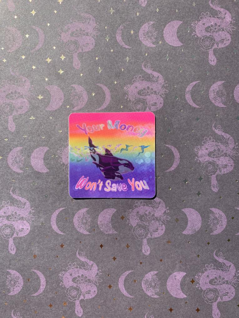 rainbow sticker with big whale and little whale in the water with the words your money won't save you around them the waves in the middle of the sticker are holographic