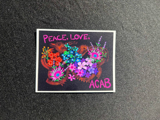 Colorful floral design over rusting handcuffs with 'Peace, Love, AGAB' text on a black background